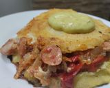 Foto del paso 8 de la receta: Arepa rellena de salchicha, pimentón, cebolla y queso🥯🌭🧀