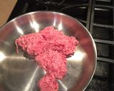 A picture of step 2 of Cara's stuffed bell peppers.