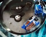A picture of step 2 of Halloween 🎃 Spooky Ghostly Oreo Treats (no cook _5 minutes Recipe).