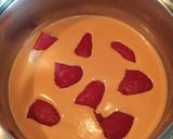Foto del paso 4 de la receta: Pimientos de piquillo rellenos de bacalao en salsa de pimiento