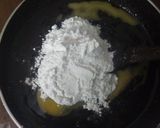 A picture of step 4 of Chocolate Biscuit Cake with Sugar coated Coconut Biscuits.