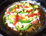 A picture of step 3 of Maggi pizza.
