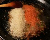 Foto del paso 13 de la receta Arroz con lentejas amarillas, malvas y alcachofas