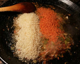 Foto del paso 13 de la receta: Arroz con lentejas amarillas, malvas y alcachofas