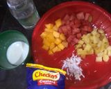 A picture of step 1 of Fruits custard.