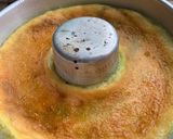 A picture of step 7 of Green Pudding with the hint of coconut powder and Pakola syrup.