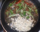 A picture of step 2 of Satvik Dal Khichadi.