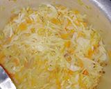 A picture of step 7 of Pilau served with cabbage and salad.