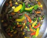 A picture of step 4 of Vegetable sukha in green curry paste.