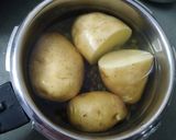 A picture of step 1 of Chana aalu masala.