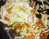 A picture of step 12 of Dambu shinkafa with veg.sauce.
