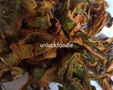 A picture of step 1 of Dry Chilli Patra.