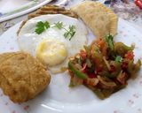 A picture of step 5 of Poached eggs,samosa,hash browns and kachumbari.
