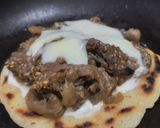 Foto del paso 7 de la receta: Arepa🫓con berenjenas tatemadas🍆agridulces🍯con queso🧀🥛🧄