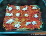 Foto del passaggio 5 della ricetta Lasagne di pane carasau con ragù di pollo e crescenza di capra
