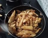 A picture of step 14 of Crispy honey chilli potato.