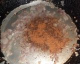 A picture of step 2 of Anda Bhurji.