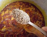 A picture of step 2 of Palm oil jallof rice.