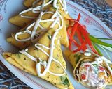 Sajtkrémes palacsinta zöldekkel háromszögbe zárva🌿 recept fázis 5 fotója