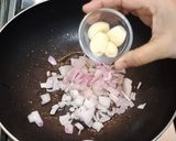 A picture of step 6 of Stuffed Chilli Curry.