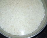 A picture of step 1 of Fried Garlic Masala Biryani.