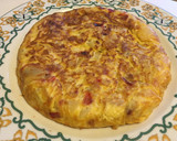 Foto del paso 7 de la receta: Tortilla de patatas con cebolla, pimiento y jamón