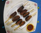A picture of step 6 of Soyabean Kebab Stick Rolls.
