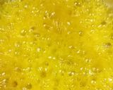 A picture of step 3 of Orange Jelly Pudding Layer in a Glass.