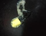 A picture of step 7 of Futomaki Black Rice Paneer Sushi role with Caramelized Banana.