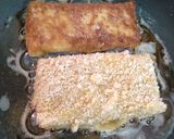 A picture of step 14 of Stuffed Maida crepe fried rolls.