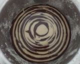 A picture of step 8 of Chocolate vanilla marbal cake.