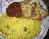 A picture of step 3 of Colored rice and fried yam with egg.
