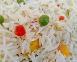 A picture of step 9 of Eggs and vegetable fried rice.