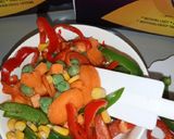 A picture of step 10 of Golden chicken with veggies.