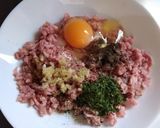 A picture of step 2 of Grandma's Meatballs - with Tomato Oregano Sauce.