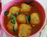 A picture of step 26 of Mysore Bonda and Ulundu bonda with Rasam.