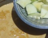 A picture of step 4 of Coconut fish curry.