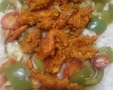 A picture of step 16 of Spicy BBQ chicken ricewith stir fry vegetables.