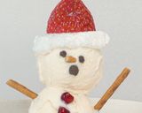 A picture of step 4 of Snow man Ice cream 🍧❄️.