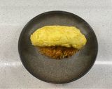 A picture of step 11 of Omurice (Japanese omelette rice).