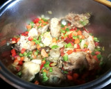 Foto del paso 3 de la receta: Arroz caldoso con conejo y verduras al cúrcuma de mi madre