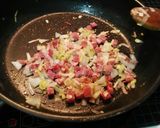 Foto del paso 3 de la receta Pimientos al gratén rellenos de cerdo especiado
