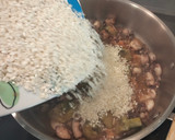 Foto del paso 7 de la receta: Arroz de chipirones y alcachofas
