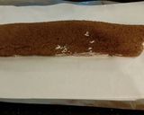 A picture of step 21 of Chocolate Strawberry Ice Cream Cake Roll.