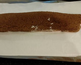A picture of step 21 of Chocolate Strawberry Ice Cream Cake Roll.