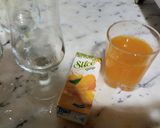 A picture of step 1 of Mango Orange Blast mocktail.