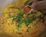 A picture of step 4 of Bharwa bhindi in dahi kadi.