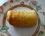 A picture of step 4 of Salmon and philly egg roll.