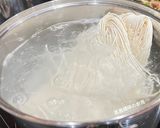 A picture of step 6 of Easy Malaysian Shrimp Noodle Soup.