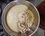 A picture of step 4 of Badam pista Rava cake.